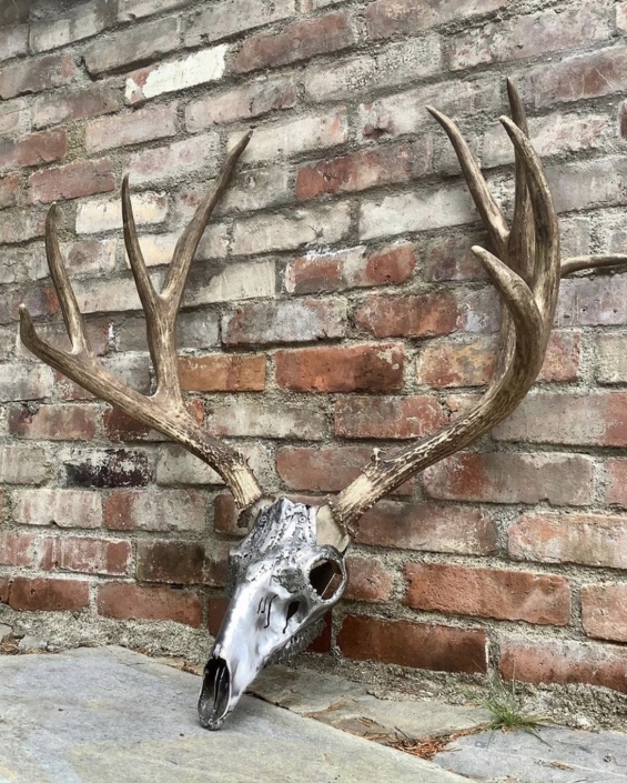 Metal deer skull