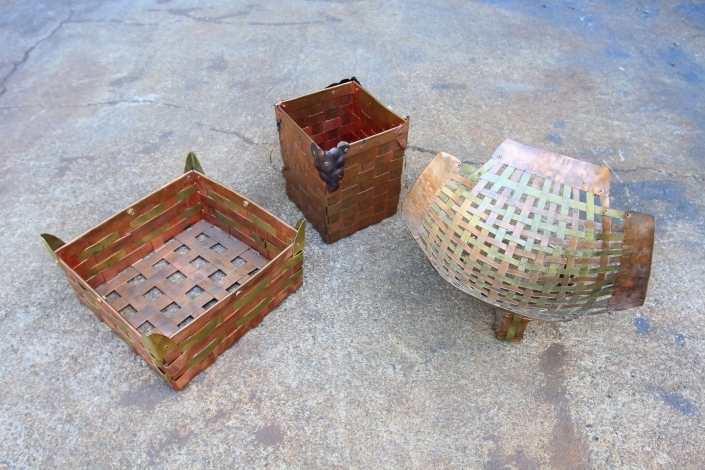 Woven brass and copper baskets